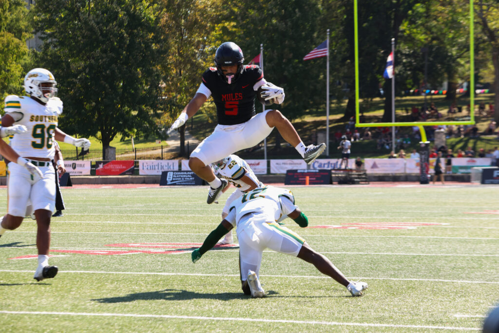 LaAngelo Bell hurdles Missouri Southern defender