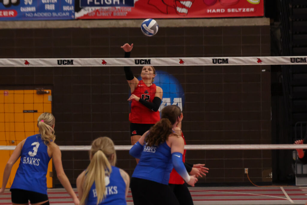 Sophomore outside hitter Emma Siron spikes the ball