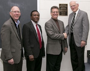 (Photo courtesy of University Relations) Congratulating Russell Coleman, right, on the dedication of the Russell Coleman Rehearsal Hall in the UCM Department of Music in the Utt Building, are, left to right, UCM President Chuck Ambrose; Gersham Nelson, dean of the College of Arts, Humanities, and Social Sciences; and Steven Moore, chair of the Department of Music.