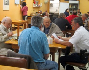 (Photo by Cliff Adams) Sheriff Chuck Heiss, right, meets with local residents for coffee and discussion at Mary Jane's Cafe Wednesday morning.