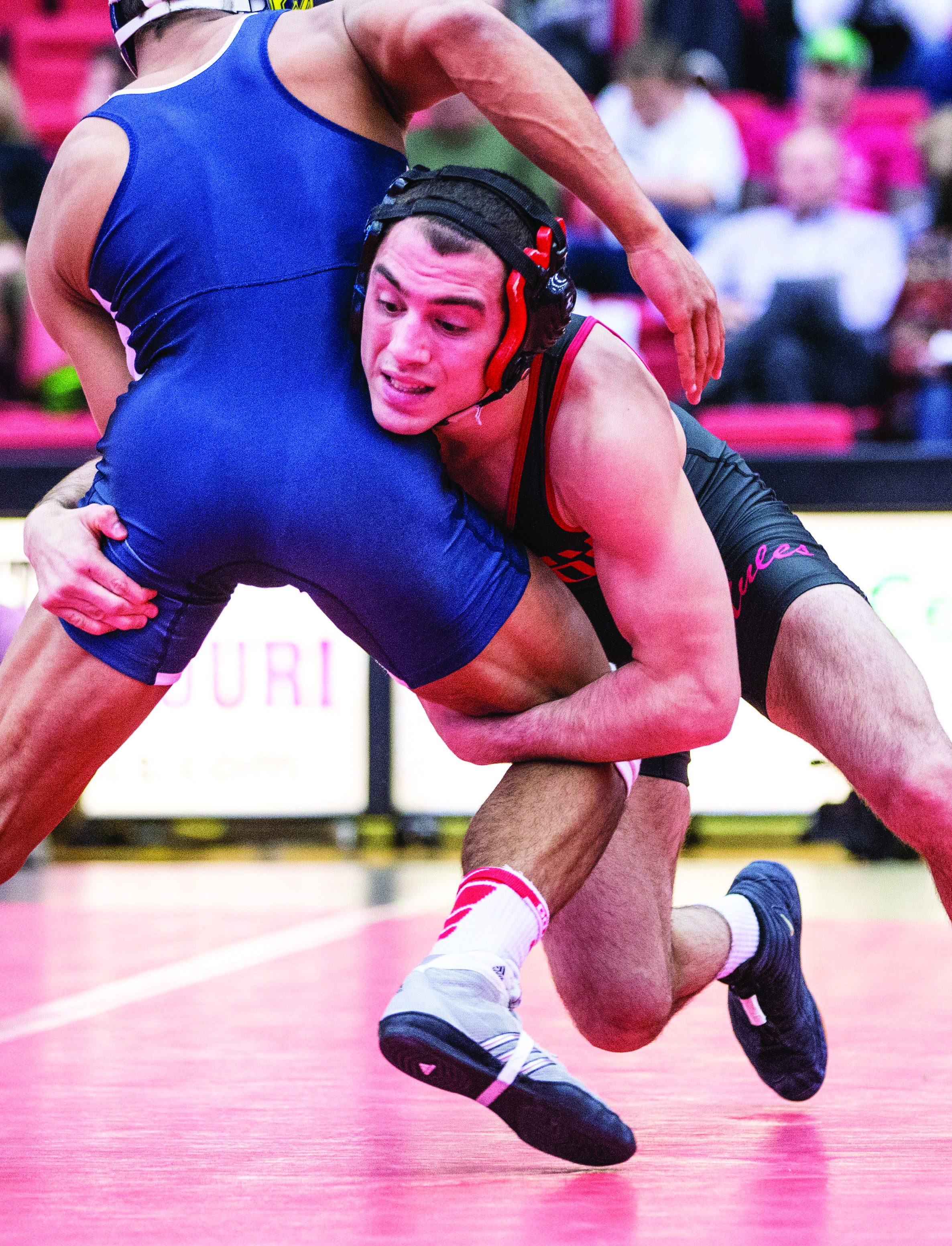 Redshirt junior Nick Viterisi wrestles during a home match. (Photo by ANDREW MATHER, Photo Editor)