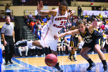 Junior Keuna Flax tries to save the ball going out of bounds during the 87-78 MIAA Tournament semifinal win over Fort Hays State Saturday. (Photo by ANDREW MATHER, Photo Editor)