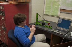 (Photo by Anna Jones) Sally Zellers discusses UCM's new seismograph.