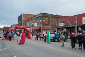 The finish line stands in front of Bodie's and Blaine's Bar & Grille. 