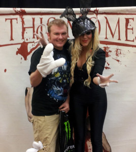 Andy Lyons and In This Moment lead singer Maria Brink pose for a photo at the show.