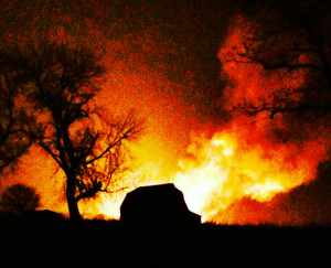 Photo by Jamie DeBacker An outbuilding is silhouetted against the flames from a gas line that ruptured shortly before midnight Thursday in Pettis County. The photo was taken five miles outside of Sedalia along Route D. DeBacker lives in Warrensburg and is a sophomore at the University of Central Missouri.