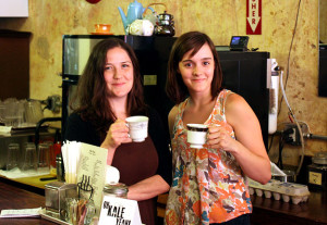 Photo by Kevin Lyon/digitalBURG Julie Kendall and Shelby Smith take a break as they close down Cafe Blackadder on Tuesday.