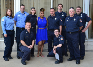 Warrensburg Fire Department, Johnson County Ambulance District, and Lifeflight Eagle personnel pose for a photo with 