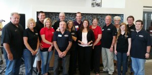 Warrensburg Collision was recently named the Warrensburg Chamber of Commerce's Business of the Year. Pictured, from left, is Steve Brewington, Beverly Brewington, Nick Novotney, Jessica Novotney, Marion Woods, Guy Reynolds, Ronnie Reynolds, Casey Lund, Jessica Lund, Penny Lund, Charlie Lund, Sandy Jennings, Ellen Becker, Ray Jennings and Josh Blaize.