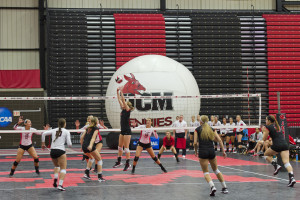 PHOTO BY SUMIT SHRESTHA / PHOTOGRAPHER Kourtney Thompson sets the ball during the Peggy Martin Challenge against the St. Cloud Huskies. The Jens won the game 3-0.