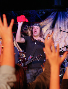 Christian O’Connor pauses between songs to throw a few T-shirts to students.