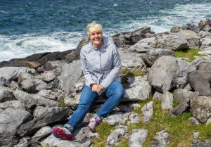 PHOTO SUBMITTED BY MEGAN STANLEY Megan Stanley sits on the rocks along the western coast near Galway, Ireland last summer. 