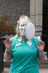 Sophomore Alyssa Kinnison is stunned after being pied in front of the Elliott Student Union for the Pie a Pi, Egg an Ep event Wednesday afternoon Sept. 2.