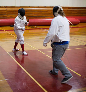 PHOTOS BY BRANDON BOWMAN / PHOTO EDITOR Eric Jefferson (left) takes on his opponent Ken Carter with a little friendly sparring Tuesday night in the Lovinger gym.