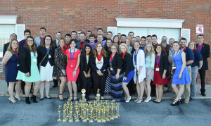 PHOTO BY MICHAEL HAWKINS The GED chapter poses with trophies and medals after competing during UCM’s homecoming. Fifty students competed this weekend, some driving back to UCM for homecoming activities in between competitions. 