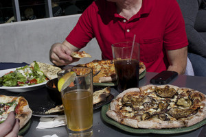 PHOTO BY ALEX AGUEROS / SPORTS EDITOR Spin! Pizza, a new restaurant at the Crossing — South at Holden, offers specialty pizza, alcohol and a patio seat to Mules home football games.