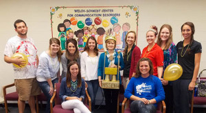 PHOTO SUBMITTED BY UCM NSSLHA UCM NSSLHA members pose with their "GOLD" trophy, a reward from NSSLHA for their active membership, philanthropy and advocacy efforts. Pictured from left to right standing, Graduate Representative to Faculty meetings Jonah Lasater; Co-Philanthropic Chair Avery Bowling;  Secretary Olivia Luelf; Vice-President Audra Woodard; Adviser Kim Stewart; President Marissa Nadler;  Social co-chair Stephanie Parlow; Treasurer Megan Riley; and Social co-chair Austee vonAhn.  Seated are Historian Ashley Shipley and Co-Philanthropic Chair Taylor Carmichael.