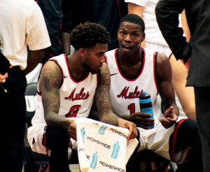 Senior guards Roosevelt Scott, left, and D'Marnier Cunningham talk on the bench during a timeout. The two were Central Missouri's top scorers in a 77-52 victory versus Concordia-St. Paul Saturday, Nov. 14.