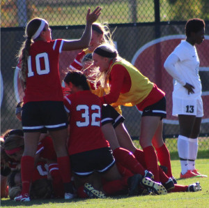 PHOTO BY TRISTAN MCCLELLAND / PHOTOGRAPHER The Central Missouri soccer team dog piles after winning their second straight MIAA Tournament over Northeastern State 1-0 Sunday.