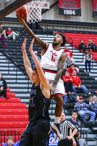 PHOTO SUBMITTED BY UCM PHOTO SERVICES Senior guard D'Marnier Cunningham attempts a layup in a 98-95 overtime loss at home to Nebraska-Kearney on Dec. 19.