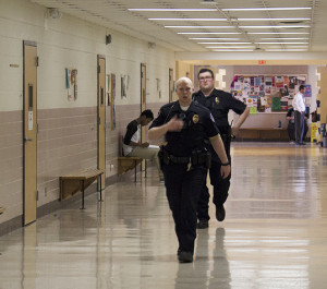 PHOTO BY BRANDON BOWMAN / PHOTO EDITOR Campus police leave Wood Building to head to the Elliott Student Union in order to interview a suspicious individual Thursday, Feb. 18.