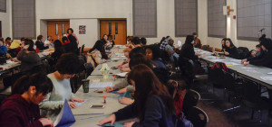 PHOTO BY MARIE NABORS / PHOTOGRAPHER Students gather around tables to practice their origami skills in Union 236 on Saturday for the Spotlight event All Things Japanese. 