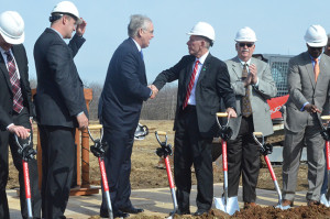 PHOTO BY CASSIE SLANA / REPORTER Nixon (left) and UCM President Chuck Ambrose shake hands at the groundbreaking ceremony.