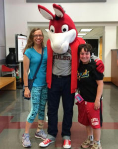 PHOTO SUBMITTED BY KRITI GOPAL Nora Becker (right) and her roommate, Michelle Beehner pose for a photo with Mo the Mule in the Elliott Student Union.