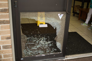 PHOTO BY BRANDON BOWMAN / PHOTO EDITOR The broken door that was found at the front entrance of the Shiloh Missionary Baptist Church on N. Main St. 