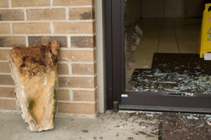PHOTO BY BRANDON BOWMAN / PHOTO EDITOR The rock that was used to vandalize the front door of Shiloh Missionary Baptist Church early Tuesday morning.