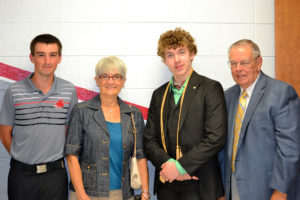 Dr. and Mrs. Ralph Younger meet the first recipients of their family’s scholarships, from left, Brett Ballard and Bear Bissen.