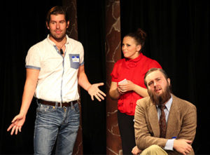 Nicholas Pogue, left, reacts to Michelangelo’s "David" as his character Leo during “Full Frontal Nudity” at the Department of Theatre and Dance’s One-Acts in Nickerson BlackBox . Nina Lopez, center, plays Bimbi; and Sam Wells, right, plays Hector.