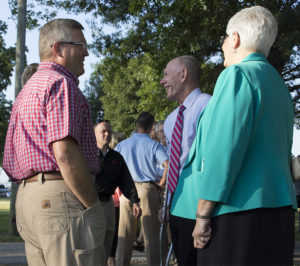 PHOTO BY MATT BIRD-MEYER / FACULTY ADVISER From left, state Sen. David Pearce, of Warrensburg, visits with UCM President Chuck Ambrose and Deborah Curtis, provost and chief learning officer, on Thursday during the Missouri State Fair Governor’s Ham Breakfast in Sedalia.