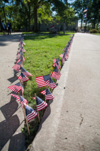 American flags line the quadrangle at the University of Central Missouri before the Patriot Day 9/11 Remembrance Ceremony on September 11, 2015. A flag was placed for every person who lost their lives in the 2001 terrorist attacks in New York City. (Photo by Samantha J. Whitehead)