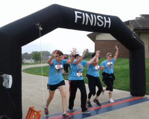 PHOTO PROVIDED BY MISSOURI VETERANS HOME - WARRENSBURG 5K racers cross the finish line. 