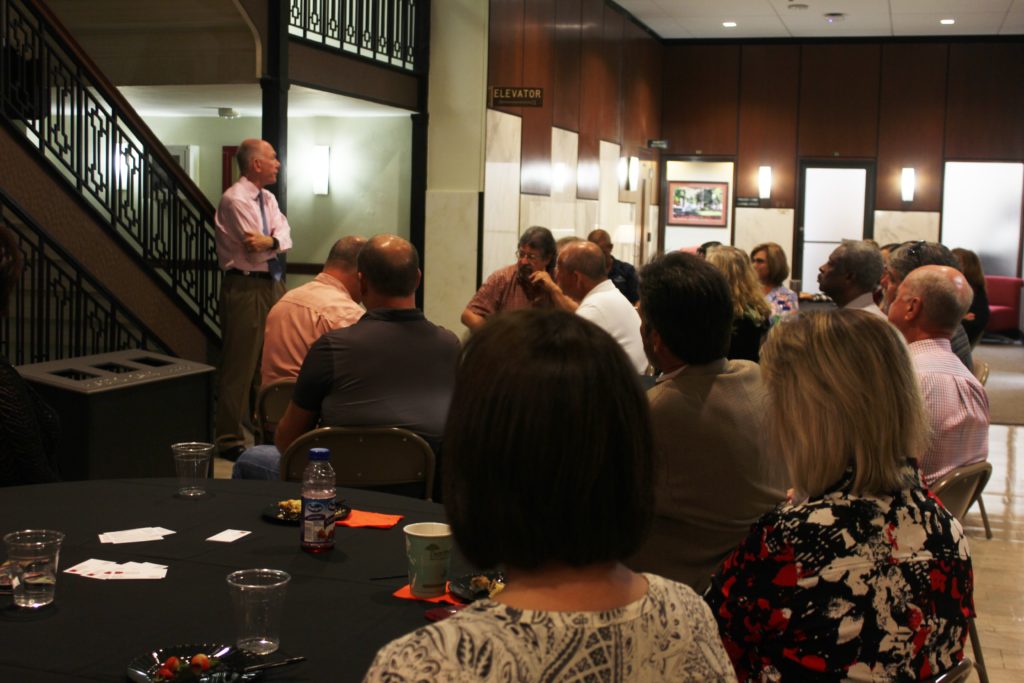 PHOTO BY KAITLIN BROTHERS/REPORTER President Chuck Ambrose greets local landlords and property managers Sept. 30 at the first appreciation coffee event.