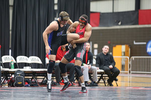 PHOTO SUBMITTED BY UCM PHOTO SERVICES Redshirt sophomore Allan Person (right) is ranked No. 5 at 174 pounds after going 17-19 overall and 3-8 in duals last season. 