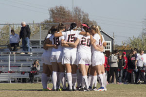 PHOT BY STEVEN SPEARS/MANAGING EDITOR The JEnnies soccer team hudles up before taking of the University of Central Oklahoma Brochos Sunday, Nov. 13, at the South Recreational Complex. The Jens earned their spot on the Central Region Championship after beating UCO 2-1.